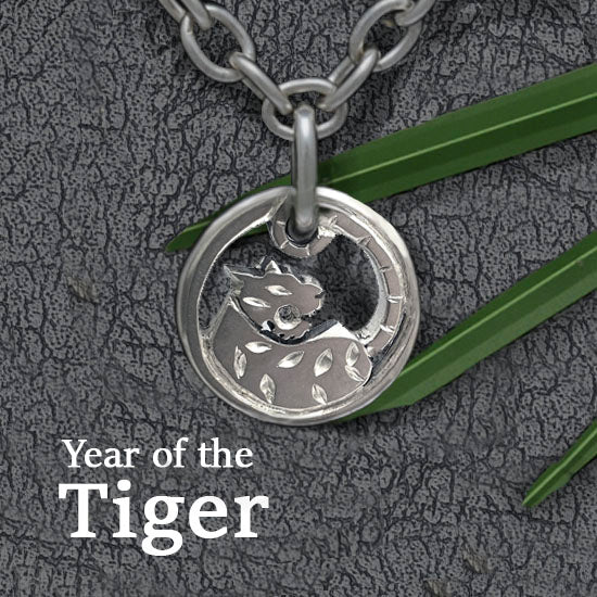 Annika Rutlin beautiful curled silver tiger jewellery