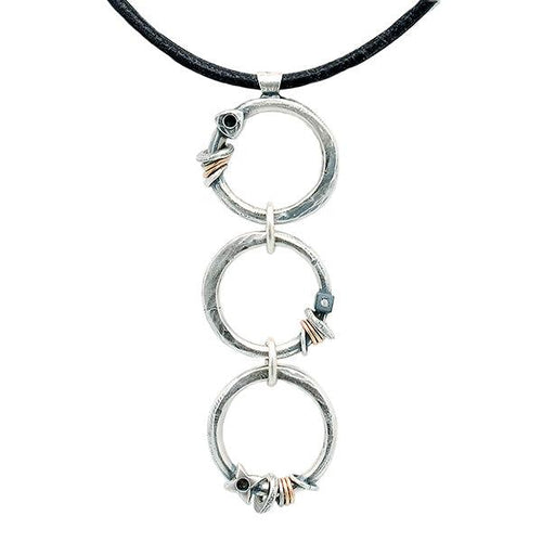 Annika Rutlin textured oxidised 3 circles pendant with hematite rings and shapes details