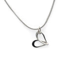 Dainty silver wire infinity loop heart pendant in sterling silver by Annika Rutlin