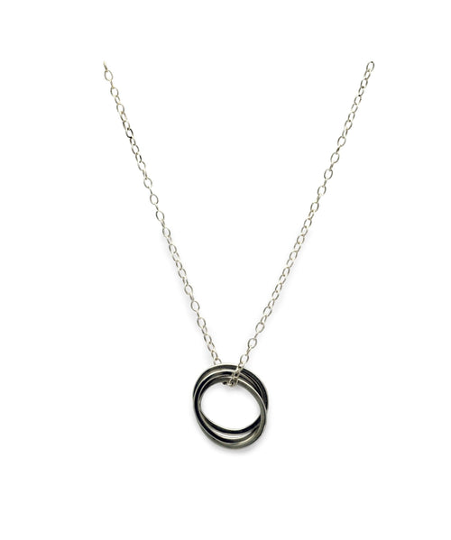 fine trace chain interlocking circles pendant Annika Rutlin