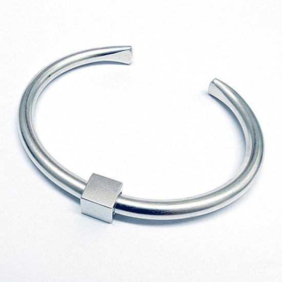 Solid cuff bangle with moving square bead - Annika Rutlin