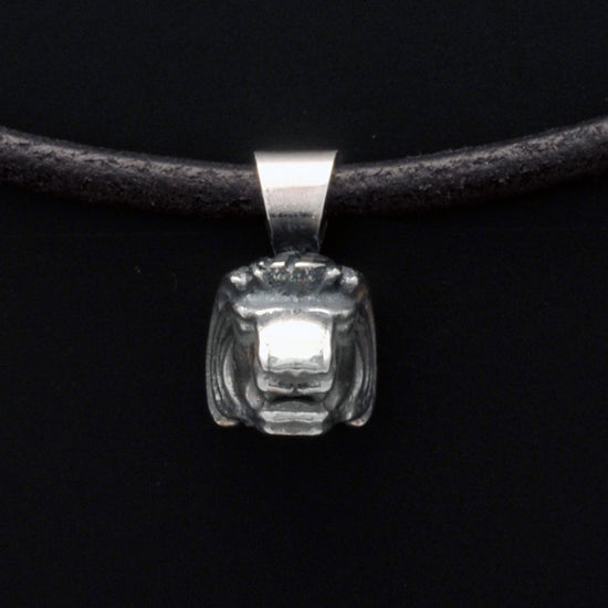 Annika RutlinLeo lion head lucky silver pendant on leather