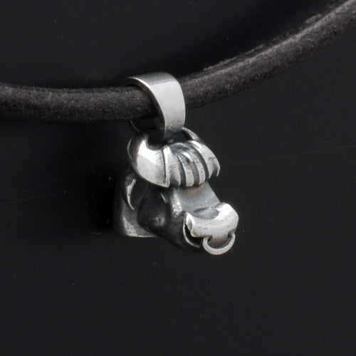 Annika Rutlinj Taurean bull silver pendant on leather thong necklace