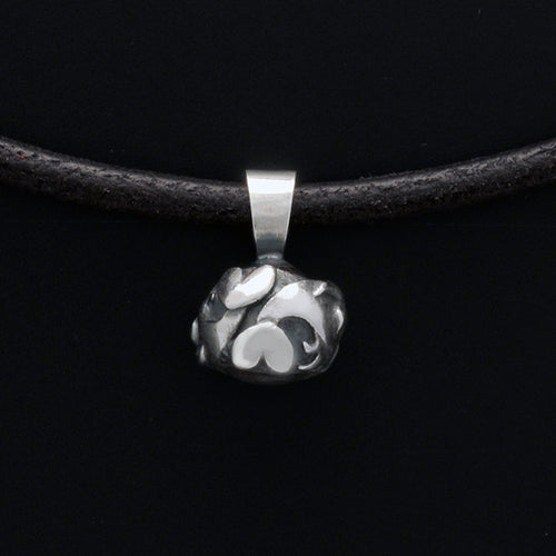 Back view of Annika Rutlin silver pisces pendant