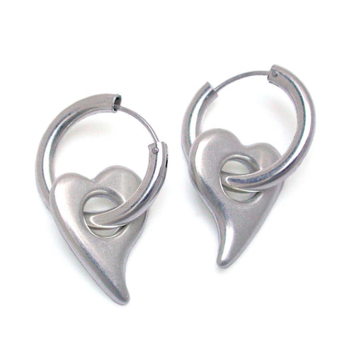 solid silver romantic soft heart earrings on sleeper hoops by Annika Rutlin