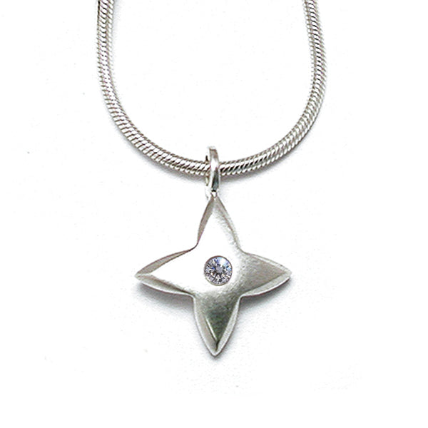 Annika Rutlin diamond set star pendant in sterling silver on snake chain