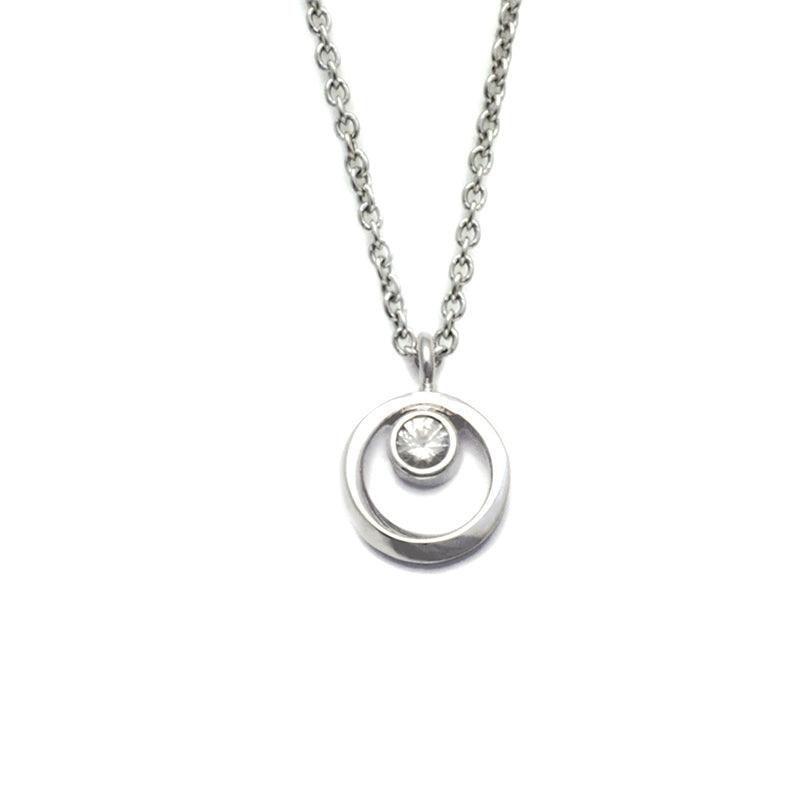 Annika Rutlin circular white sapphire sunrise silver pendant on chain