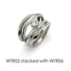 set of 3 plain and 1 offset white sapphire ring by creative designer jeweller Annika Rutlin