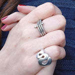 Annika Rutlin solid silver Efja wavy ring and Idun ring on hand model