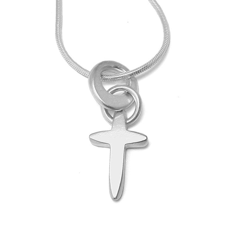 Unique sterling silver carved faceted cross by Annika Rutlin jewellery