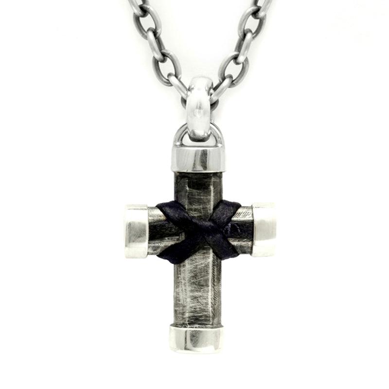 Unusual chunky solid silver cross featuring ossell knot in leather on trace chain