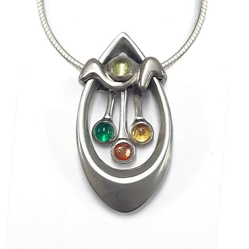 Annika Rutlin Kindred medium pendant representing the family in gemstones and sterling silver with designer jewellery