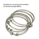 Annika Rutlin linked solid silver designer bangles stack commission