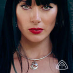 Annika Rutlin Efja wavy pendant torc necklace on model