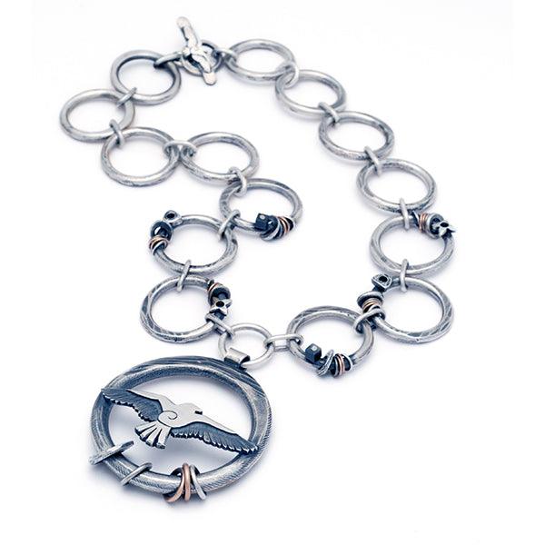 Raven oversized forged circle necklace with raven bird pendant RN82 - Annika Rutlin
