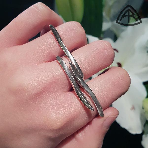 Annika Rutlin unusual finger crossing silver rings