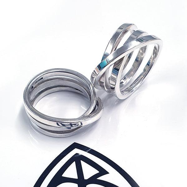 coil twisted sterling silver wide rings by Annika Rutlin