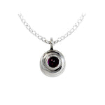 Annika Rutlin kindred collection zodiac birthstone jewellery. Silver swirl pendant with a choice of stones