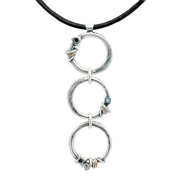 Raven collection forged circles, with rings and details, pendant RN78L - Annika Rutlin