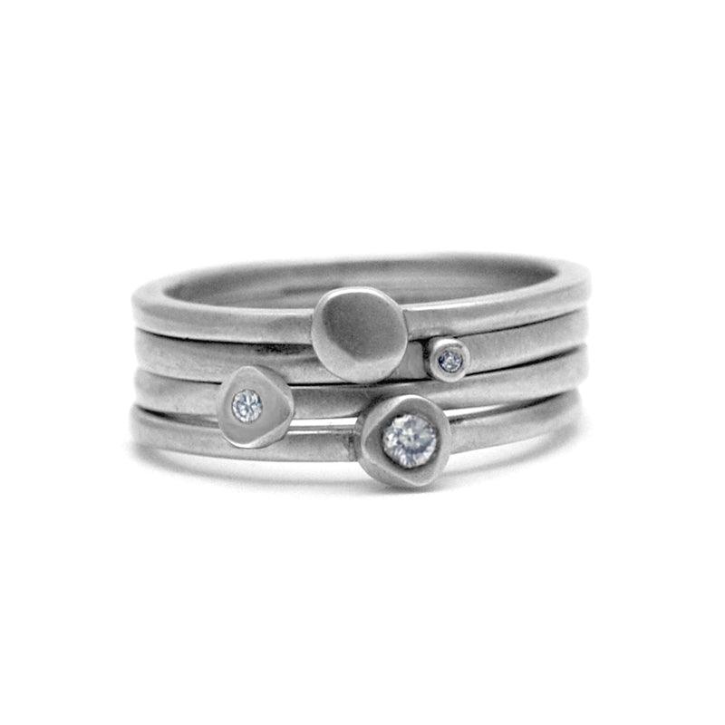 gorgeous silver stacking ring set of 4 plain and diamond rings by Annika Rutlin