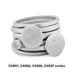 stack of 6 silver and diamond rings from the Cairn collection by Annika Rutlin