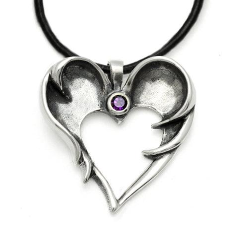 Solid silver winged pendant set with an amethyst gemstone by Annika Rutlin
