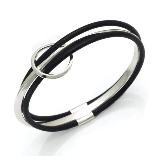 Unusual lather and solid silver oval triple bangle by jeweller Annika Rutlin