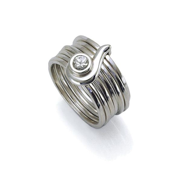 silverand white sapphire designer ring representing 7 chakras by Annika Rutlin