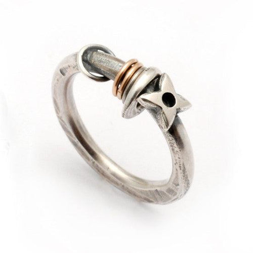Annika Rutlin Raven collection dramatic stacking ring with an original ix of silver black and red metal colours